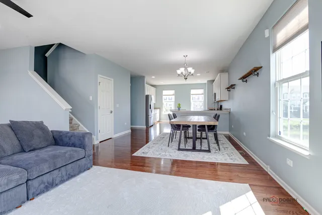 a room with furniture and a book shelf