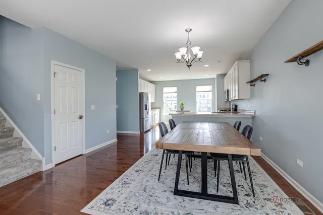 a living room with furniture window and a flat screen tv