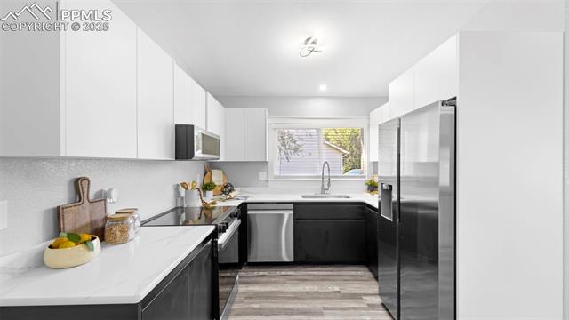 562 Blossom Field Road Fountain, CO 80817 - Photo 8 of 41 Custom made soft close kitchen cabinets