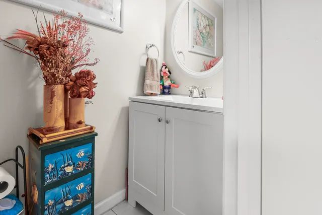 a kitchen that has a lot of cabinets in it and appliances