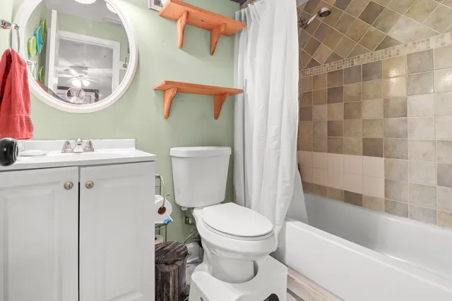 a view of patio with a table and chairs