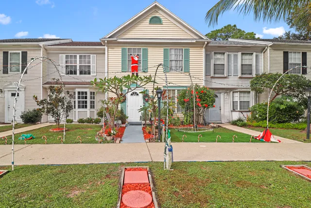 an aerial view of a house with a garden