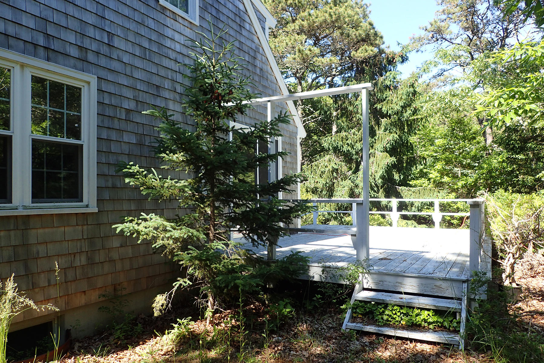 5 Blackfish Road Truro, MA 02666 - Photo 12 of 21 a house view with a garden space