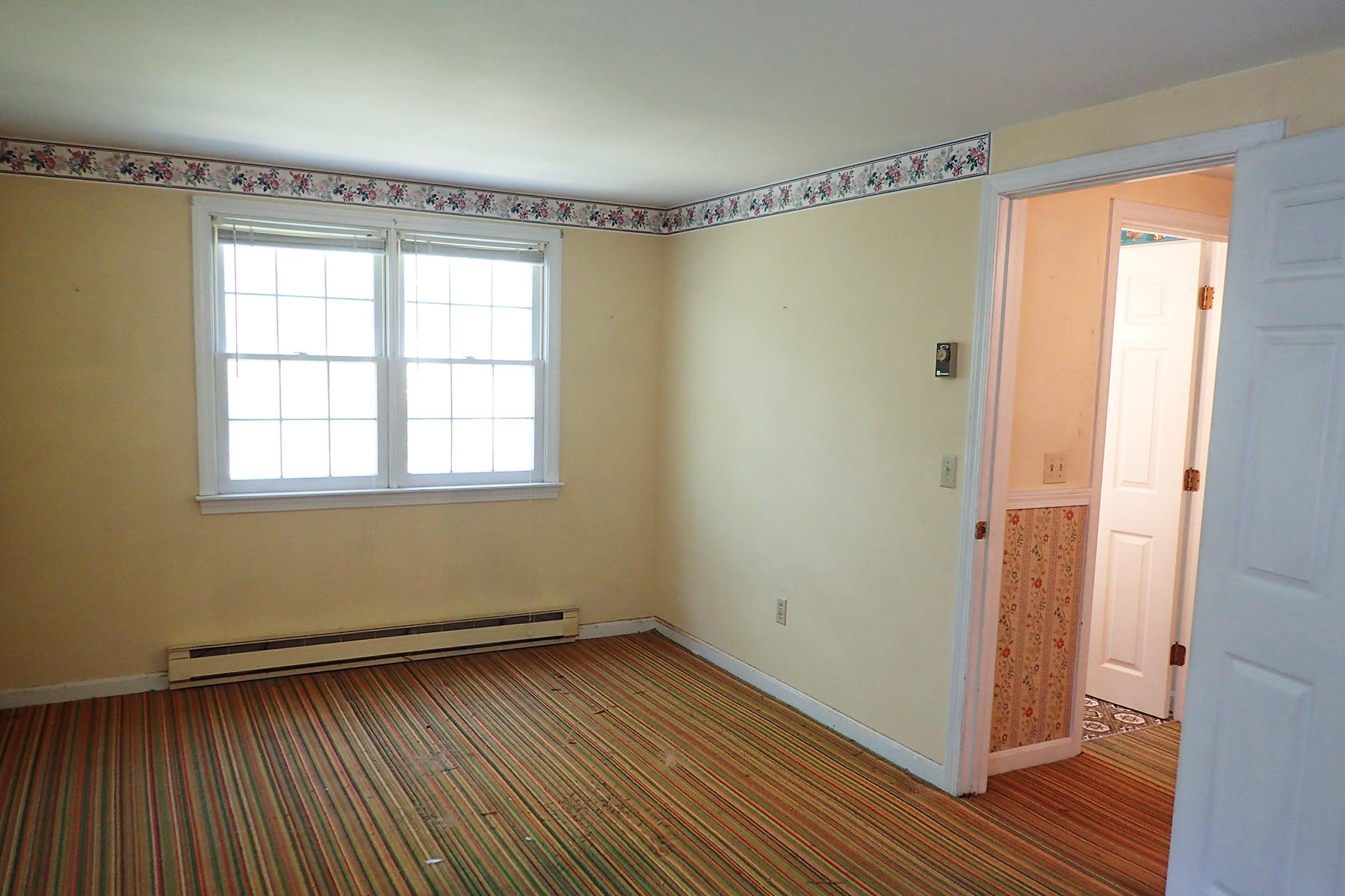 5 Blackfish Road Truro, MA 02666 - Photo 17 of 21 a view of a room with wooden floor and windows