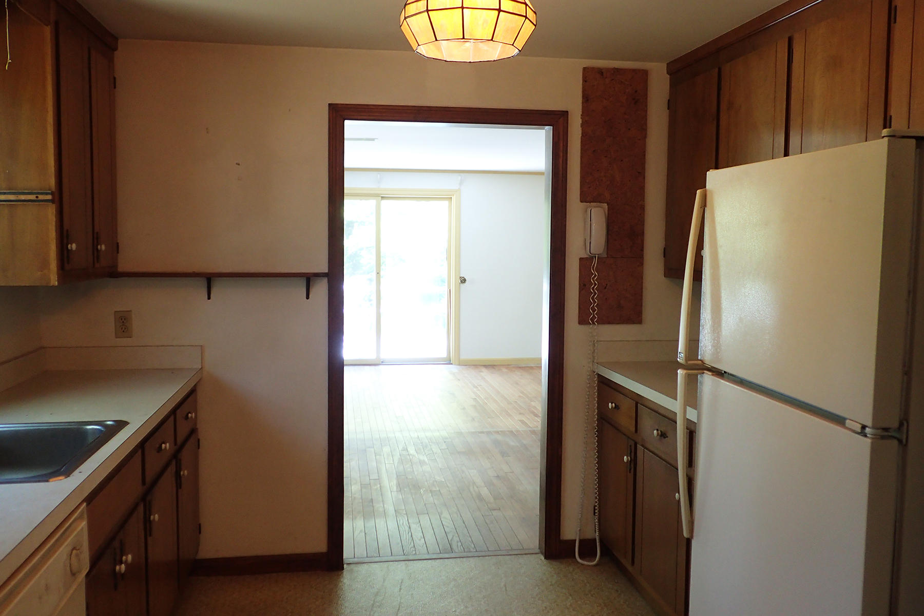 5 Blackfish Road Truro, MA 02666 - Photo 7 of 21 a kitchen with metallic refrigerator freezer and a dishwasher