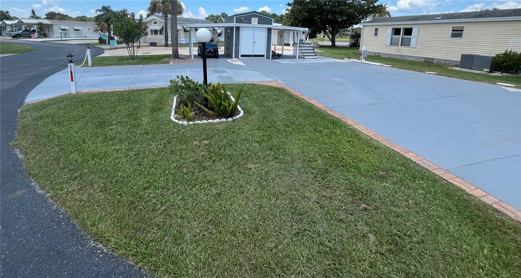 a swimming pool with barbeque oven