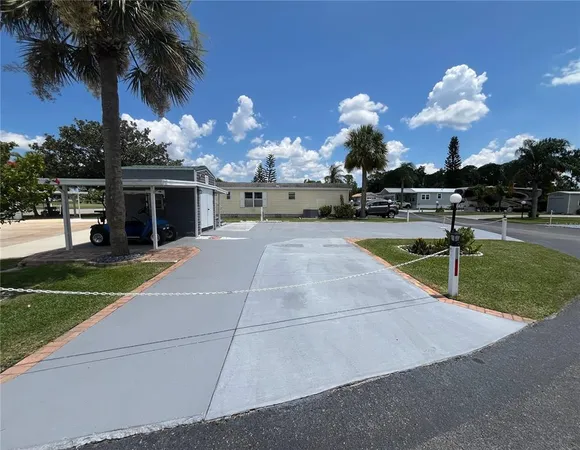 a view of a backyard of the house
