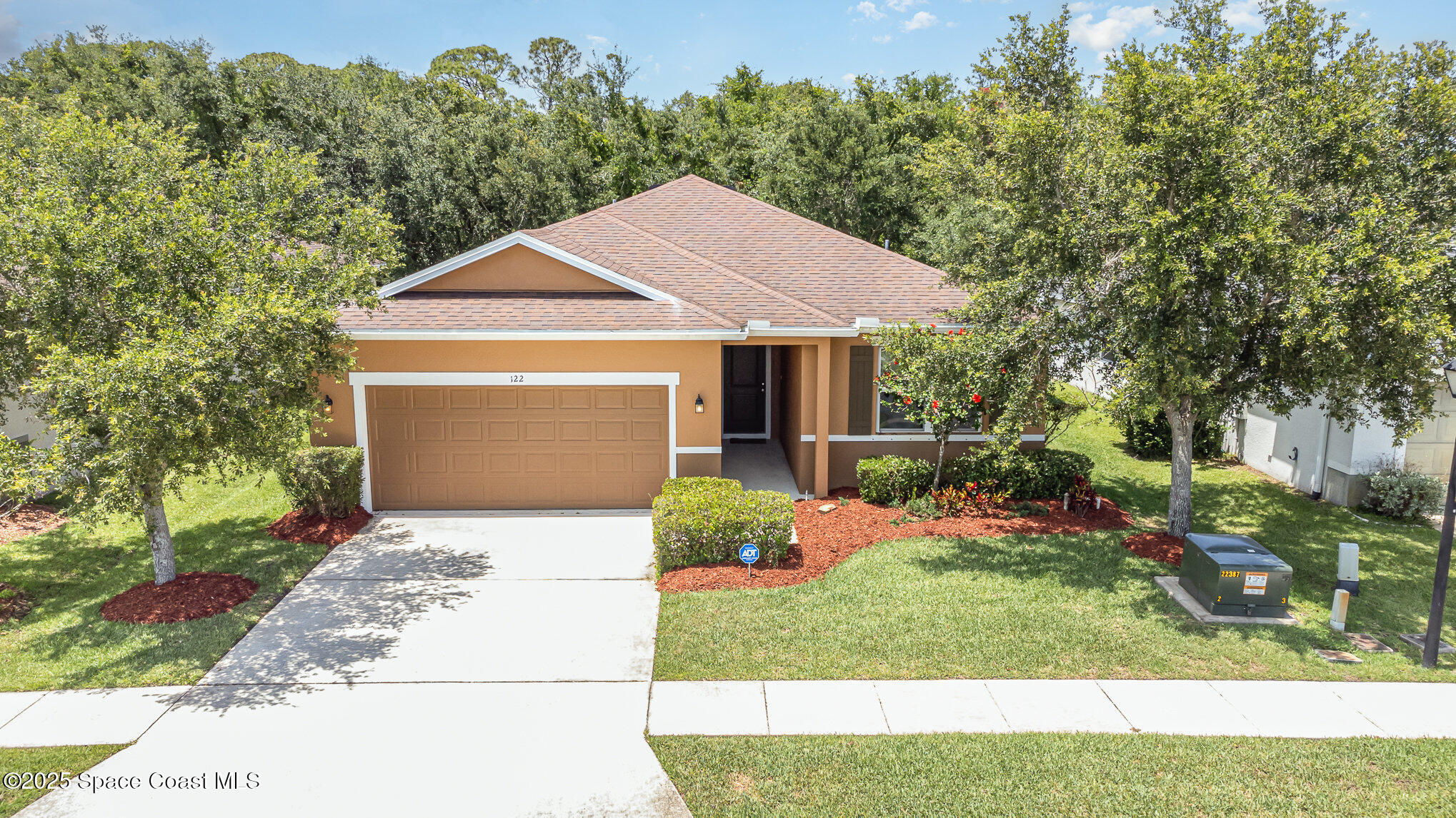 122 Port Royal Court Sebastian, FL 32958 - Photo 1 of 26 a front view of a house with garden