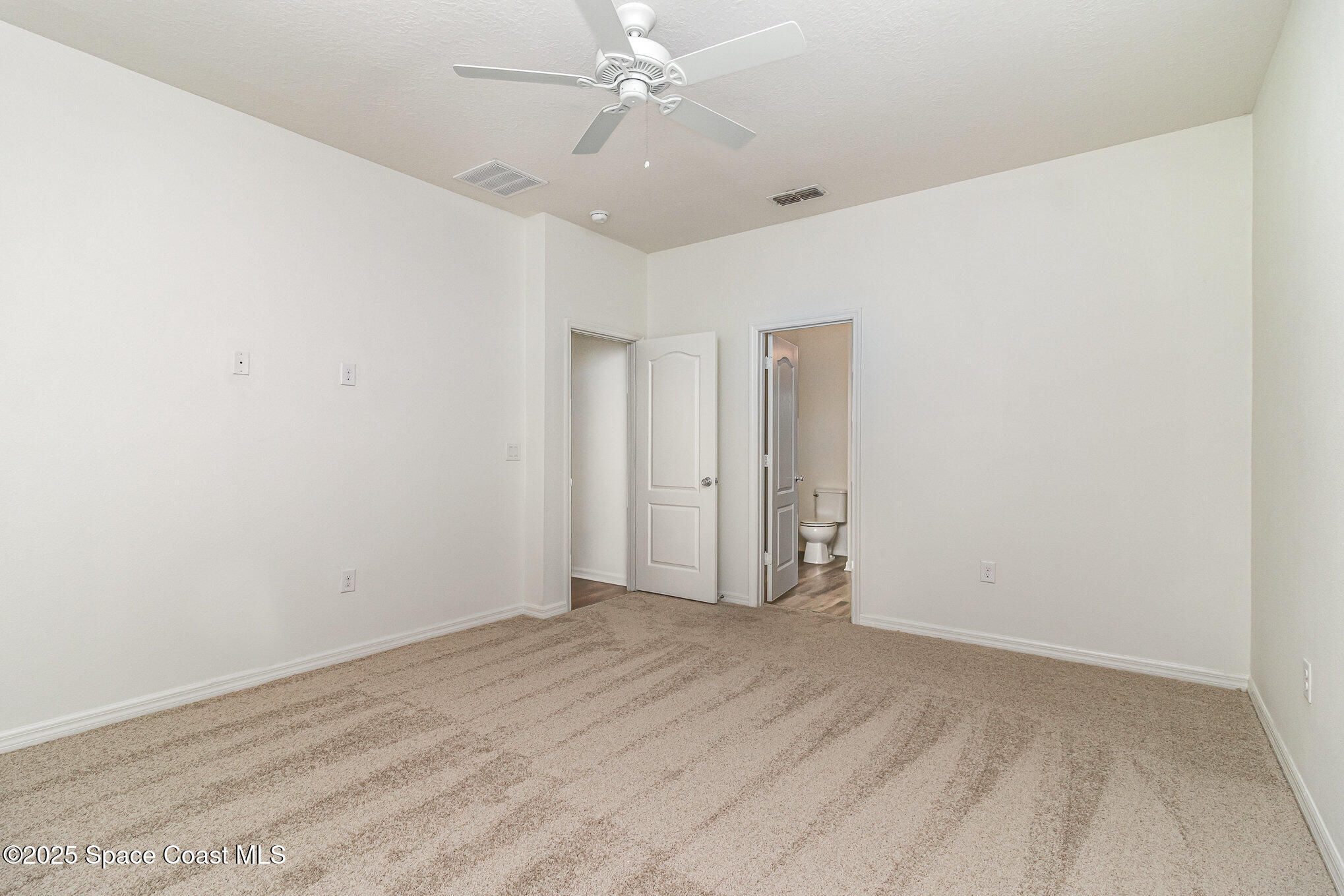 122 Port Royal Court Sebastian, FL 32958 - Photo 9 of 26 wooden floor in an empty room