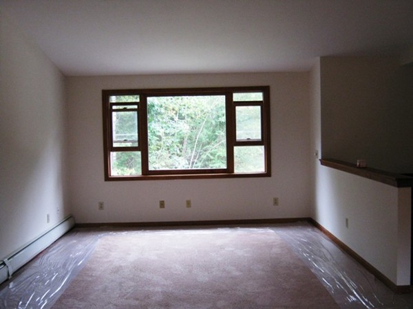 64 Colburn Road Milford, NH 03055 - Photo 6 of 17 an empty room with a window