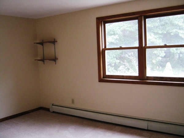 64 Colburn Road Milford, NH 03055 - Photo 9 of 17 an empty room with a window