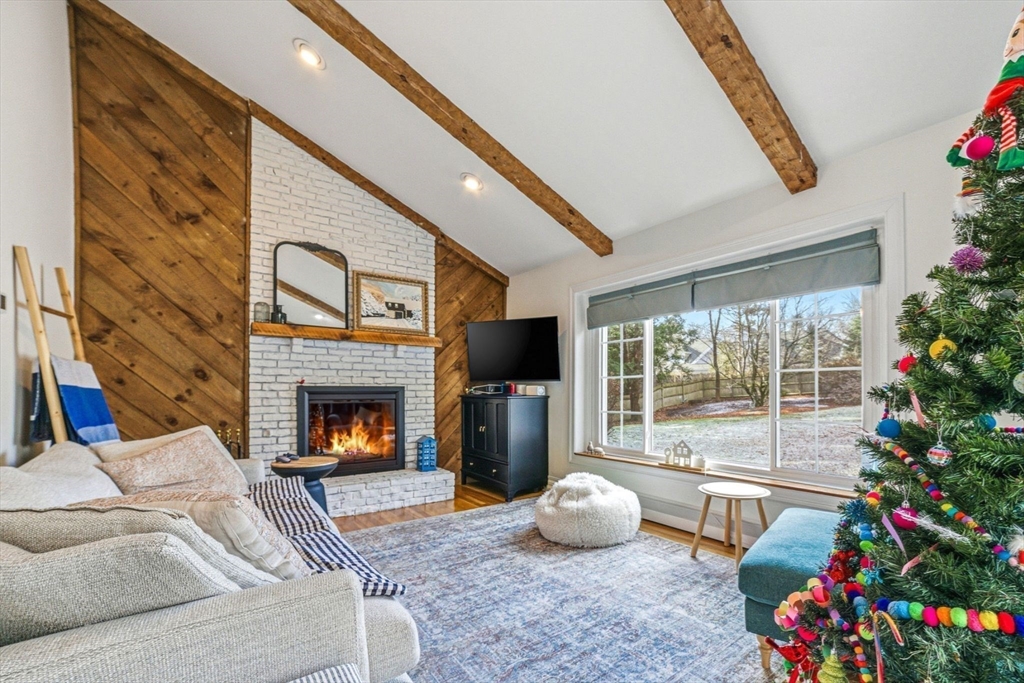 6 Montaup Road, Unit 6 Sharon, MA 02067 - Photo 11 of 35 a living room with furniture and a fireplace