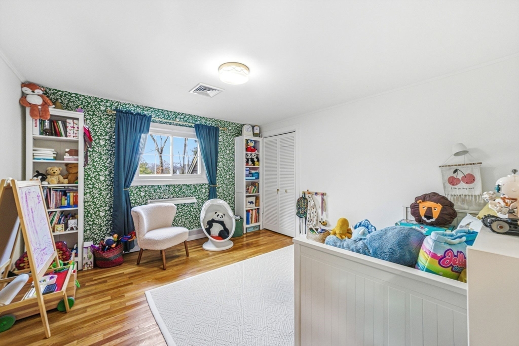 6 Montaup Road, Unit 6 Sharon, MA 02067 - Photo 19 of 35 a living room with furniture and a wooden floor