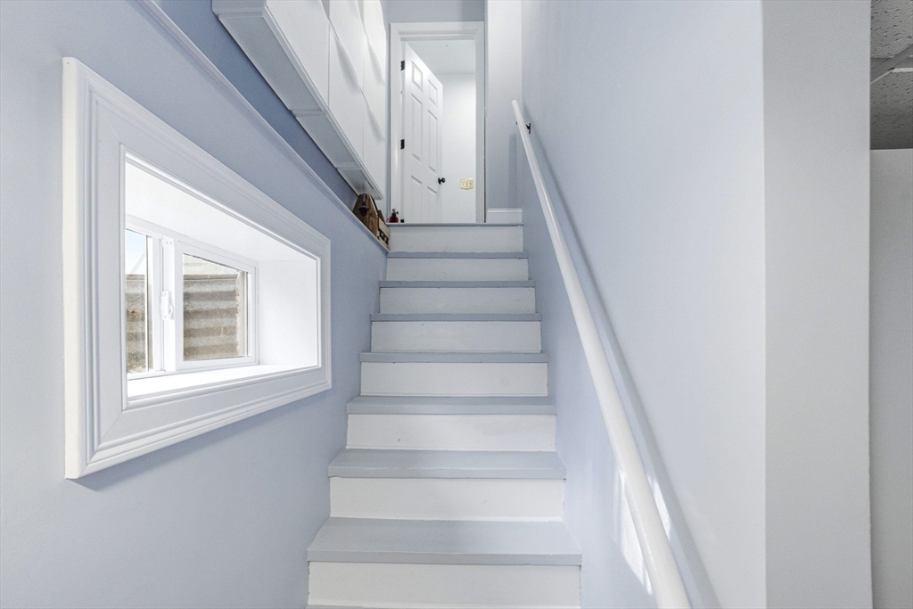6 Montaup Road, Unit 6 Sharon, MA 02067 - Photo 24 of 35 a view of staircase with white walls and windows