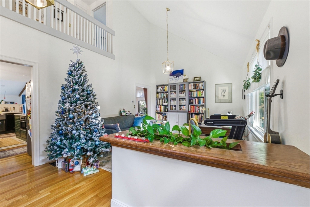 6 Montaup Road, Unit 6 Sharon, MA 02067 - Photo 3 of 35 a room with lots of flower plants and wooden floor