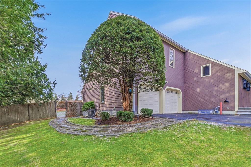 6 Montaup Road, Unit 6 Sharon, MA 02067 - Photo 32 of 35 a front view of a house with a yard