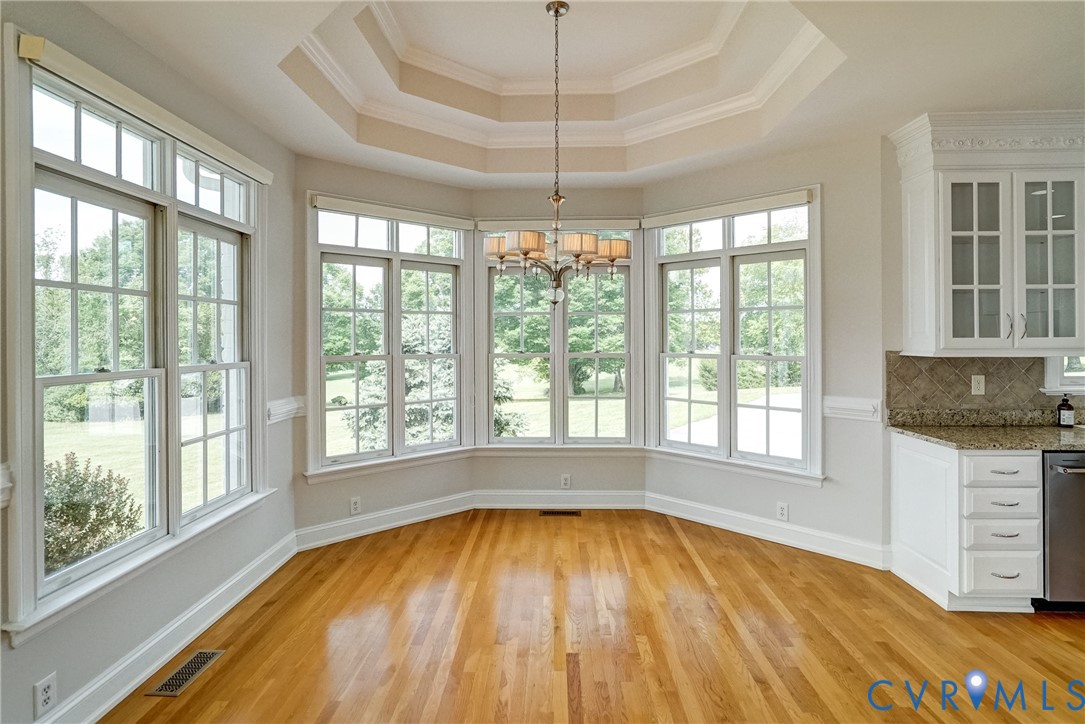 721 Meadow View Ridge Manakin-Sabot, VA 23103 - Photo 15 of 45 a view of empty room with a window and wooden floor