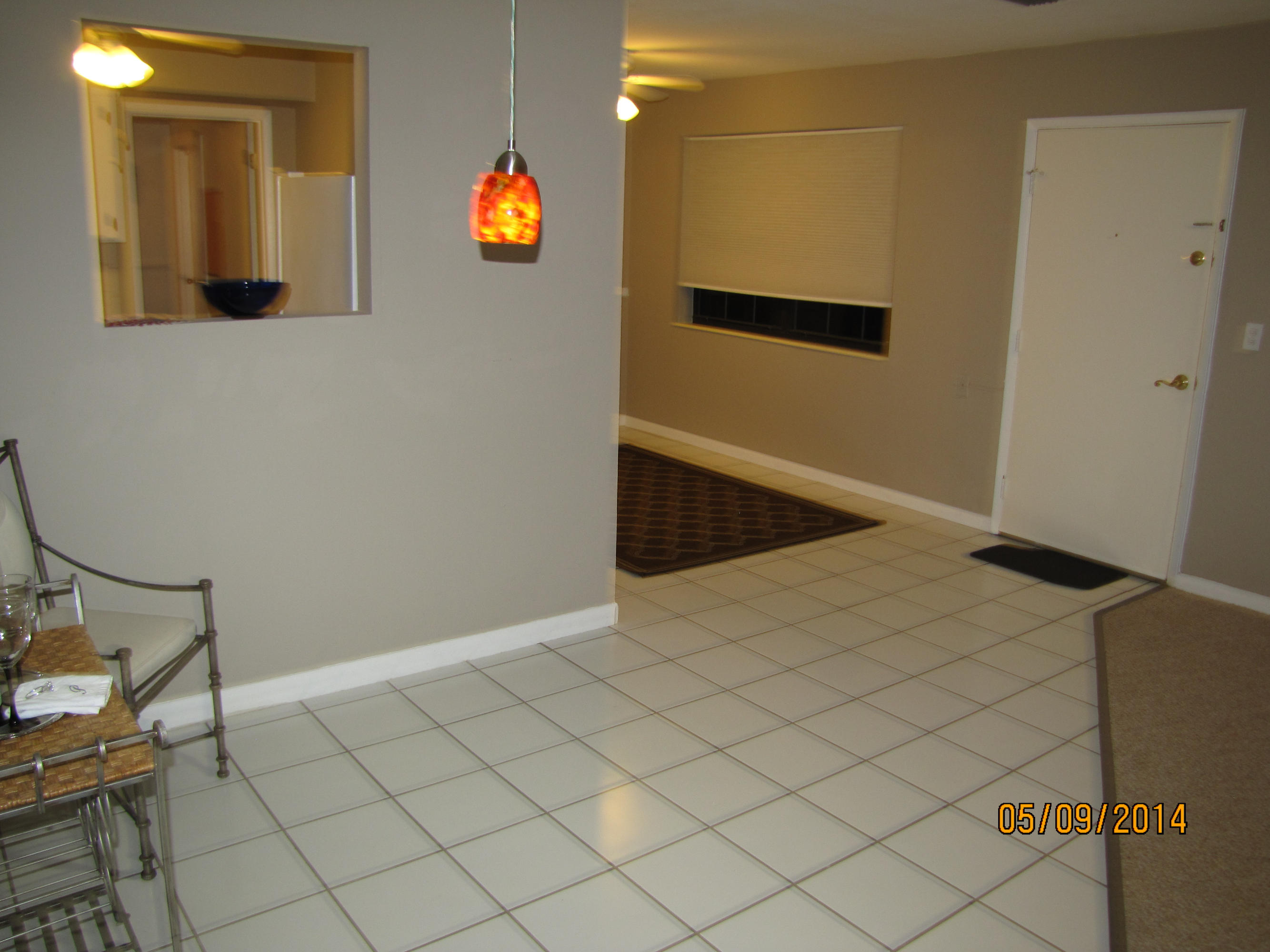 2145 Northeast 4th Way Boca Raton, FL 33431 - Photo 12 of 41 a view of a hallway with paintings on the wall