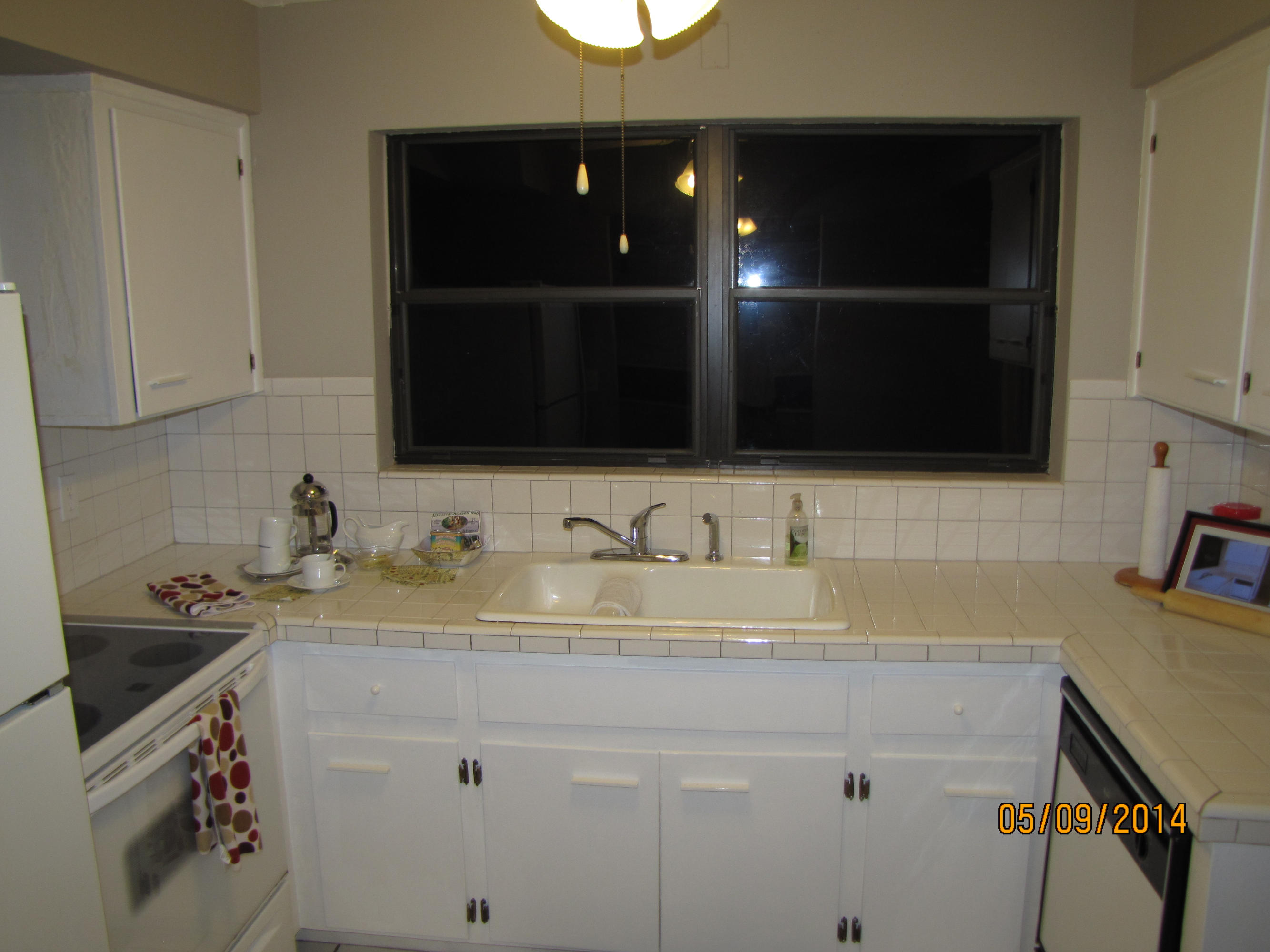 2145 Northeast 4th Way Boca Raton, FL 33431 - Photo 26 of 41 a bathroom with a sink and a mirror