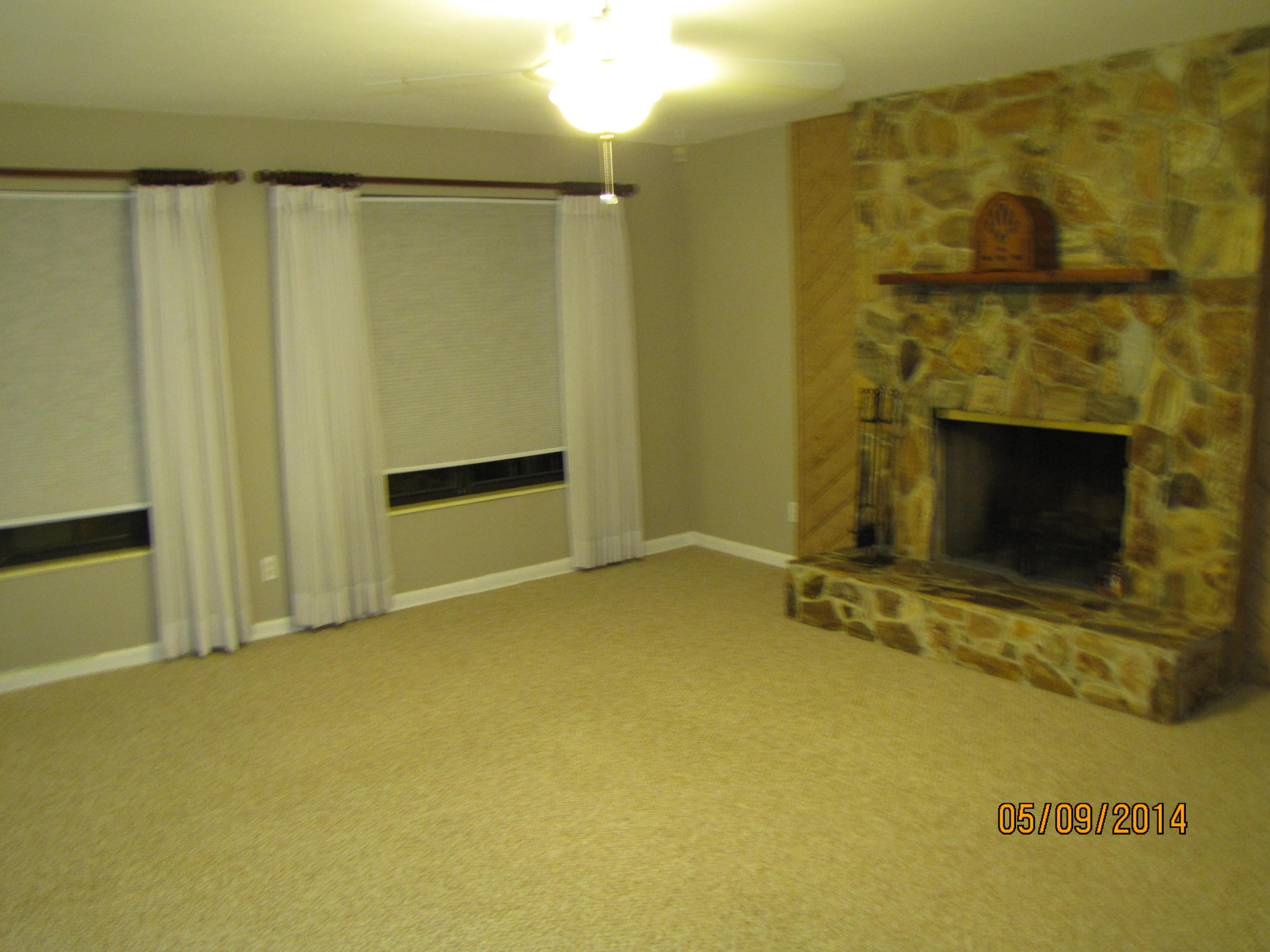 2145 Northeast 4th Way Boca Raton, FL 33431 - Photo 32 of 41 a view of an empty room with a fireplace