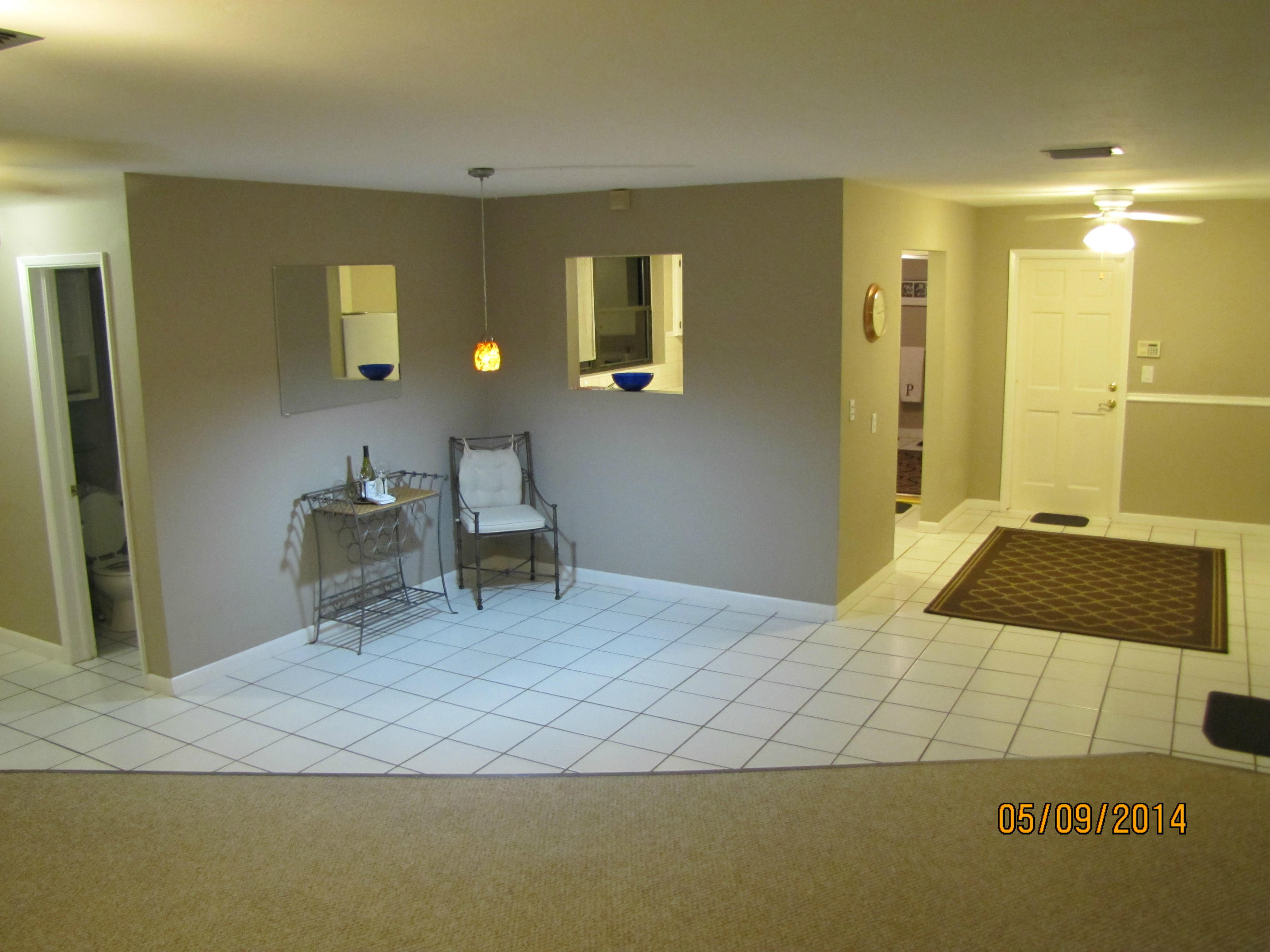 2145 Northeast 4th Way Boca Raton, FL 33431 - Photo 34 of 41 a bedroom with a bed and a mirror