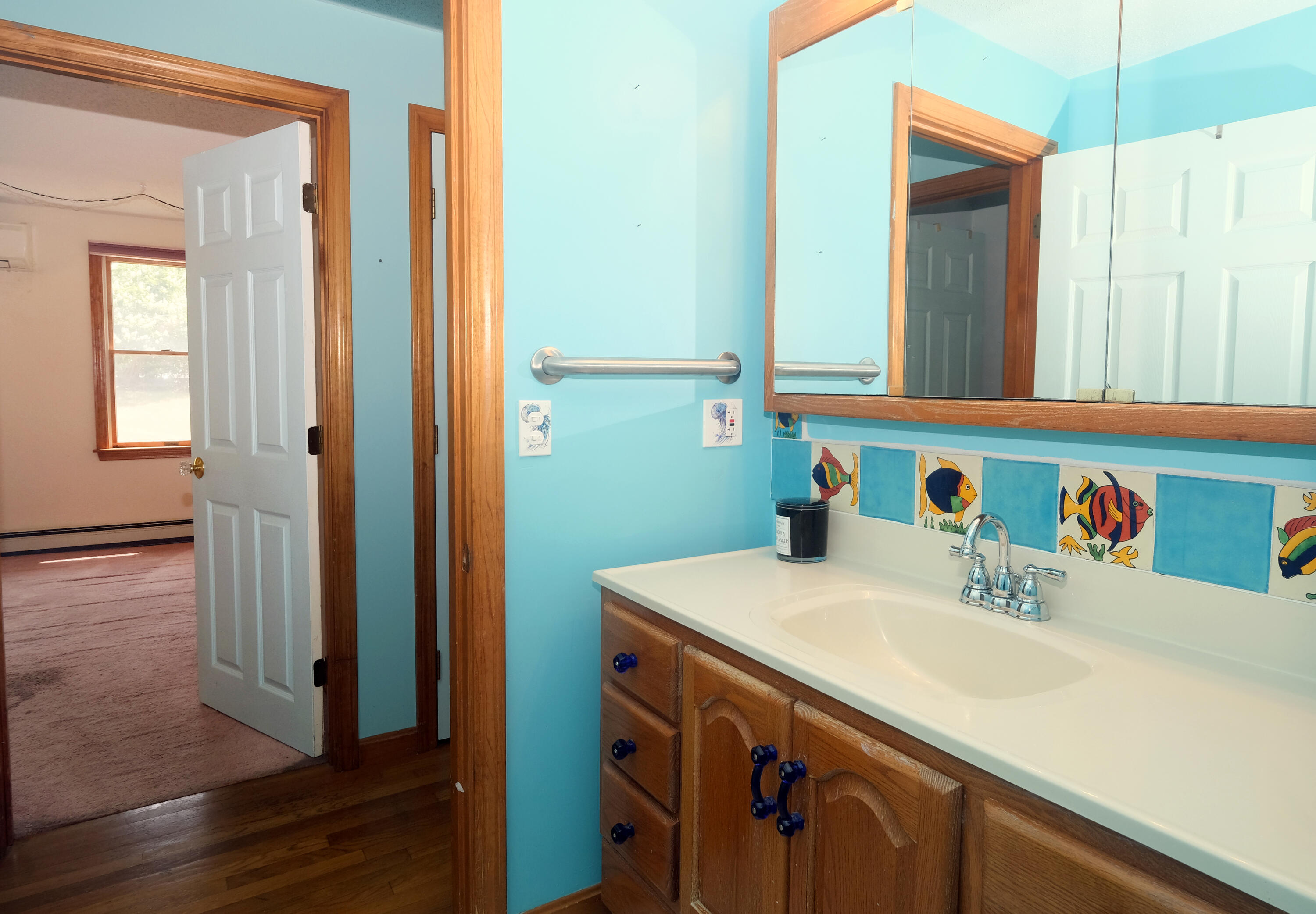 16 Partridge Lane Harwich, MA 02645 - Photo 17 of 44 a bathroom with a sink and a mirror