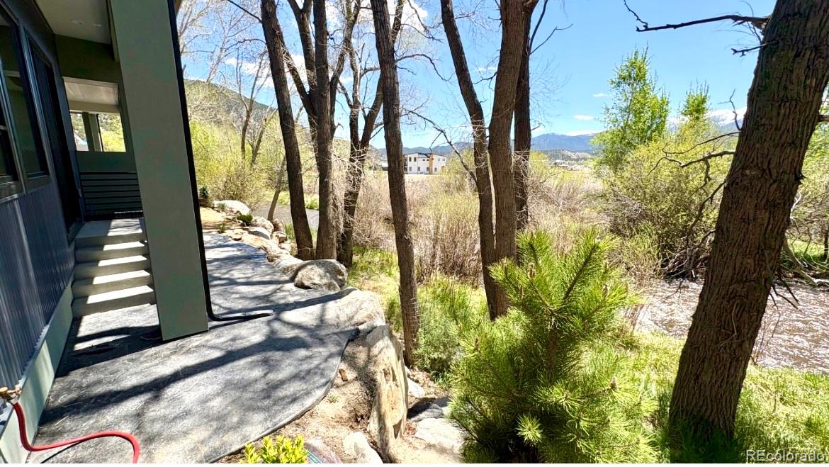 a view of swimming pool from a yard