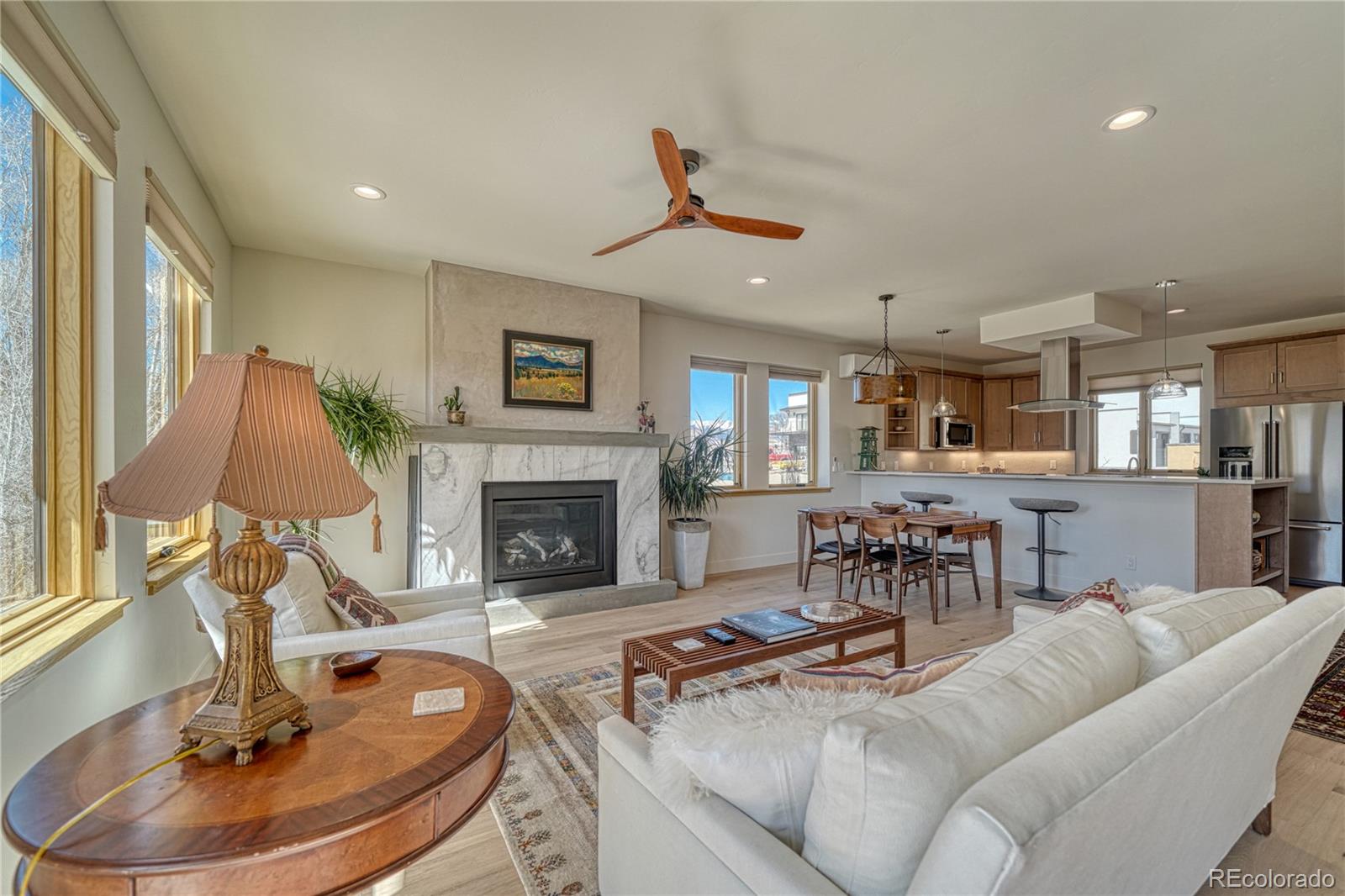 205 Two Rivers Road, Unit G Salida, CO 81201 - Photo 13 of 29 a living room with furniture and a fireplace