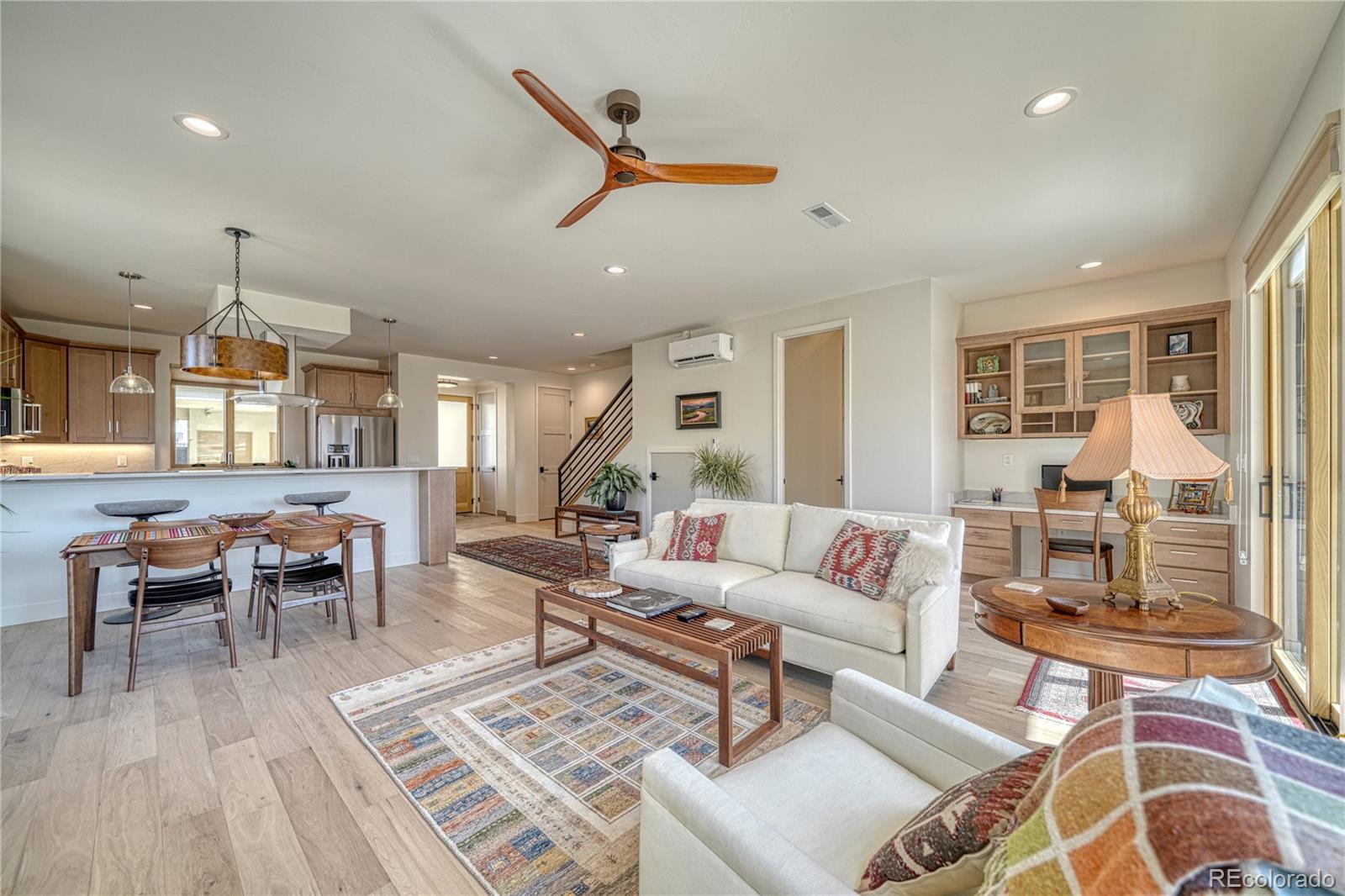 205 Two Rivers Road, Unit G Salida, CO 81201 - Photo 14 of 29 a living room with furniture and a large window