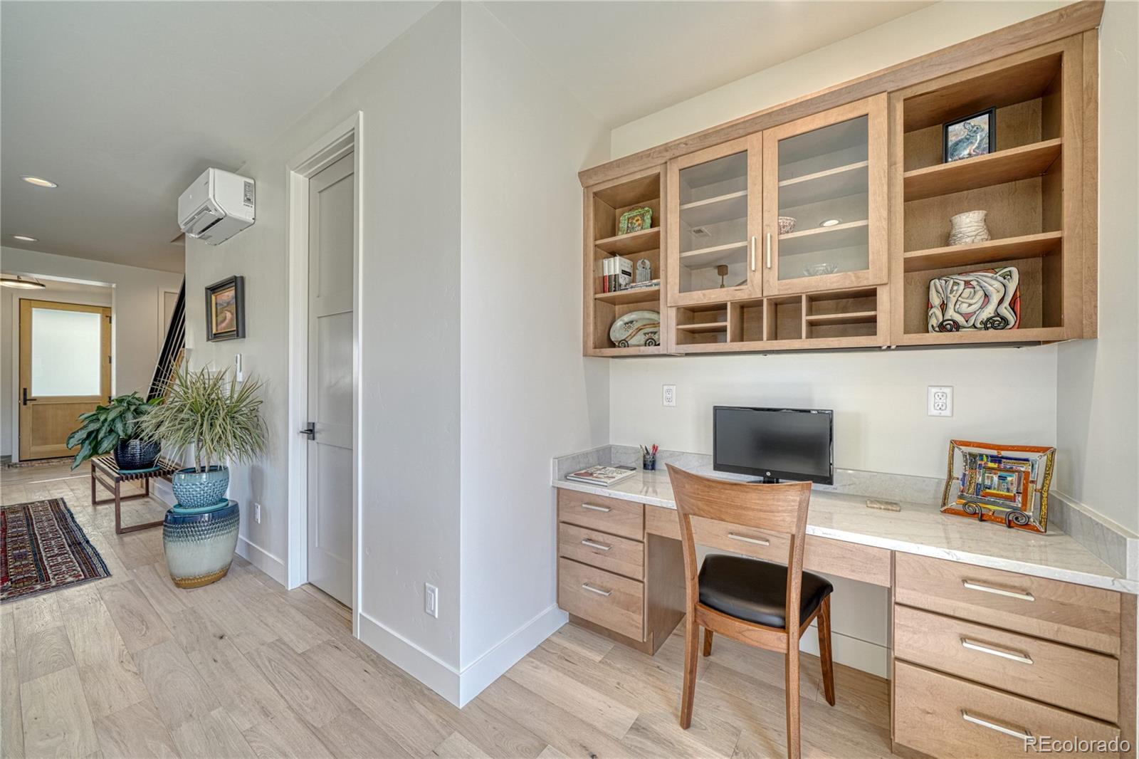 205 Two Rivers Road, Unit G Salida, CO 81201 - Photo 15 of 29 a work space with furniture and potted plants