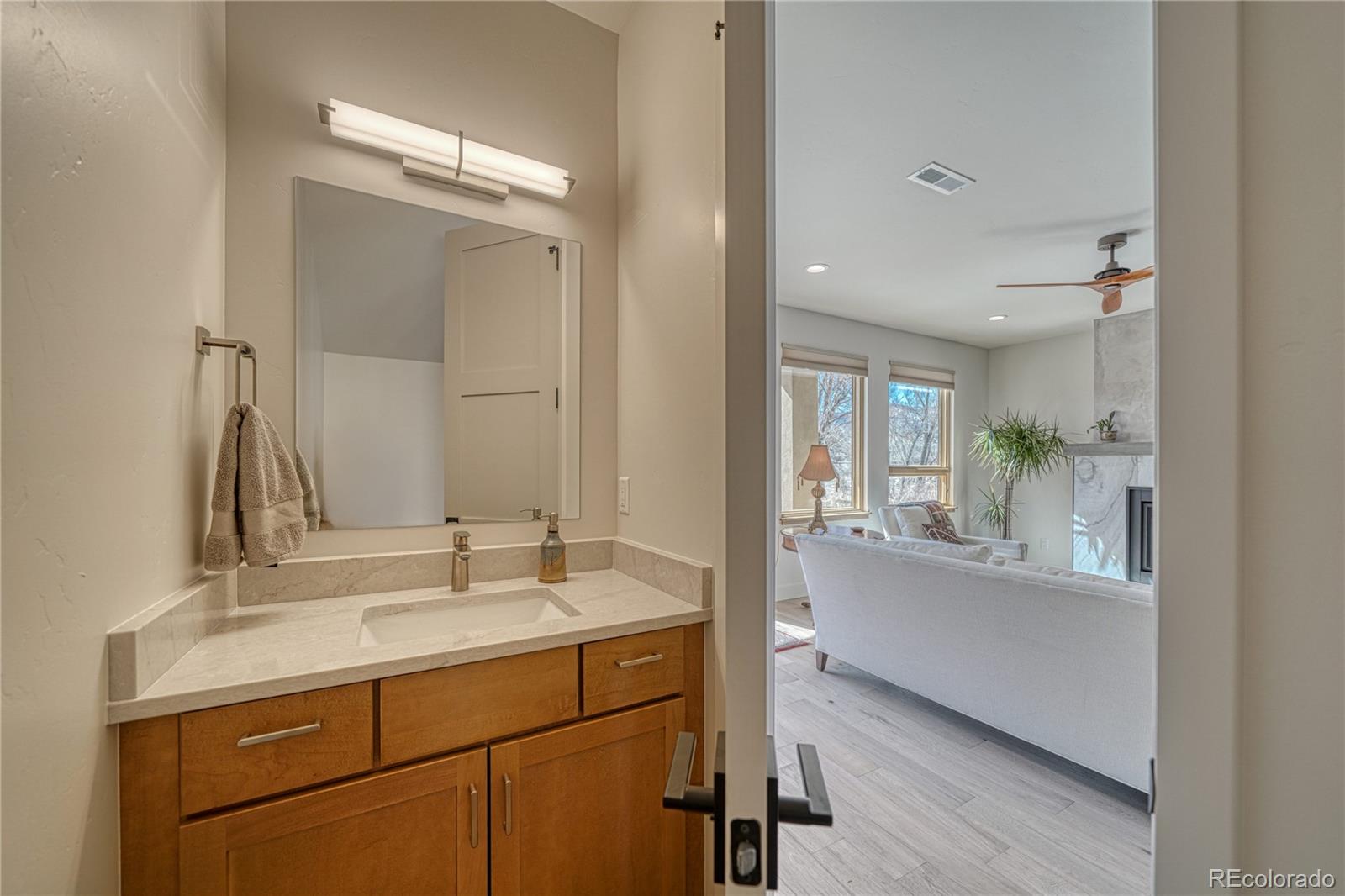 205 Two Rivers Road, Unit G Salida, CO 81201 - Photo 21 of 29 a bathroom with a sink and a mirror