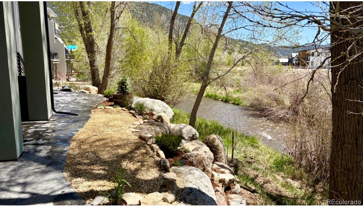 205 Two Rivers Road, Unit G Salida, CO 81201 - Photo 27 of 29 a view of a backyard of the house