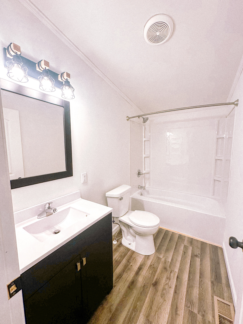 4920 Mt Moriah Road Galatia, IL 62935 - Photo 20 of 33 a bathroom with a sink a toilet and shower