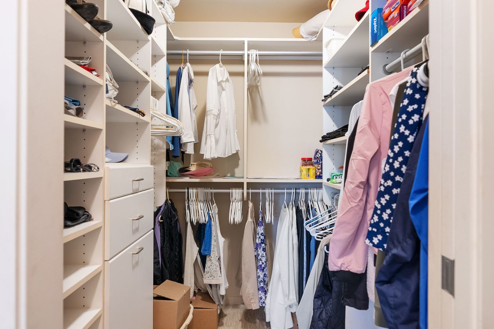 1410 North State Parkway, Unit 10B Chicago, IL 60610 - Photo 9 of 25 a view of walk in closet with clothes and shoes