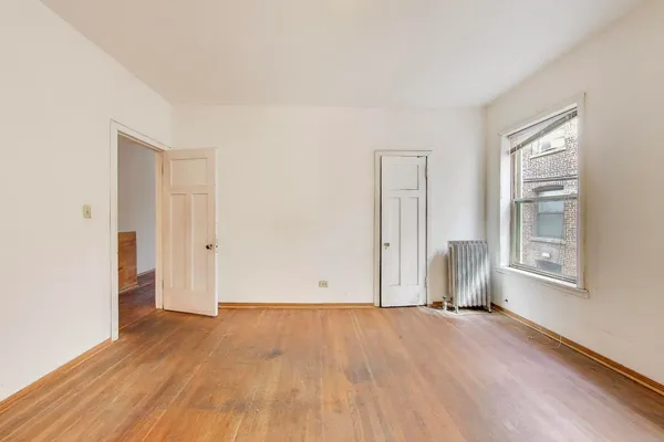 an empty room with an entryway