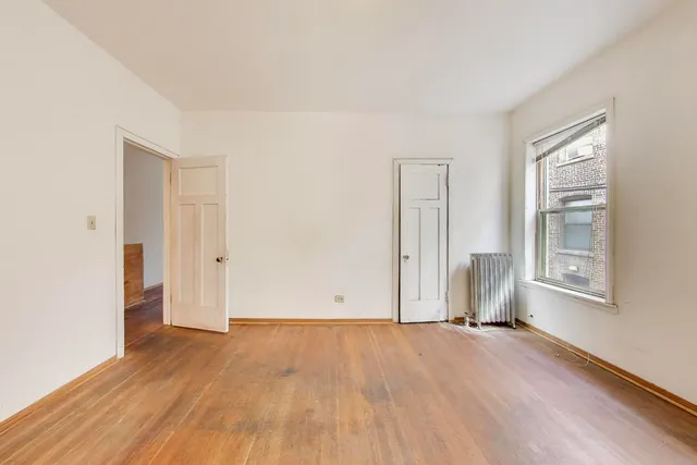 an empty room with an entryway