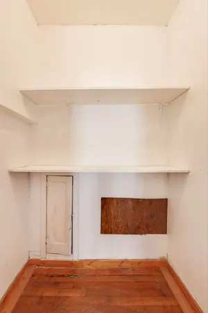 a bathroom with a toilet a sink and shower