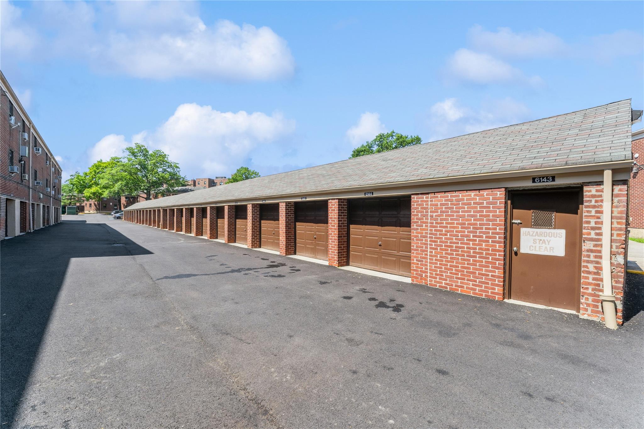 217-22 73rd Avenue, Unit UPPR Queens, NY 11364 - Photo 14 of 17 View of road with community garages