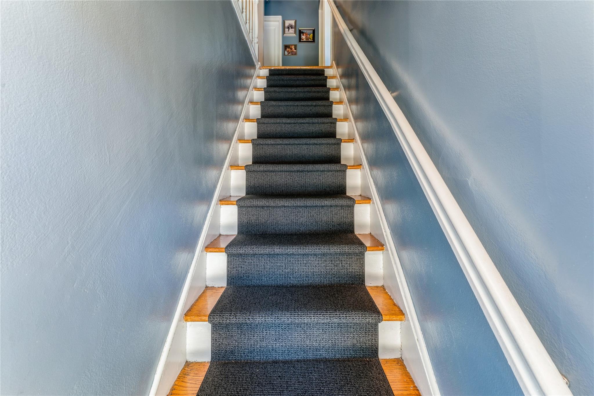 217-22 73rd Avenue, Unit UPPR Queens, NY 11364 - Photo 17 of 17 Staircase with wood finished floors