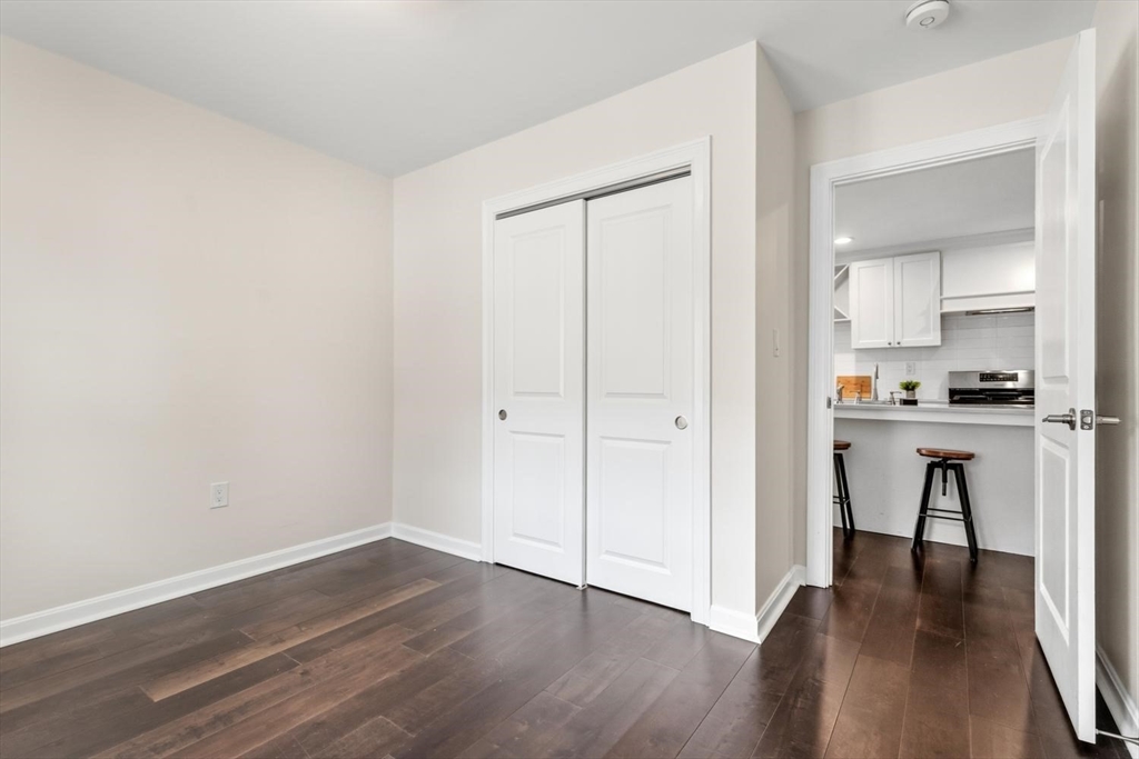 63 Century Street, Unit 2 Medford, MA 02155 - Photo 18 of 35 a view of kitchen with wooden floor and electronic appliances