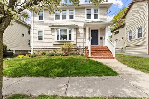 a view of outdoor space yard and front view of a house