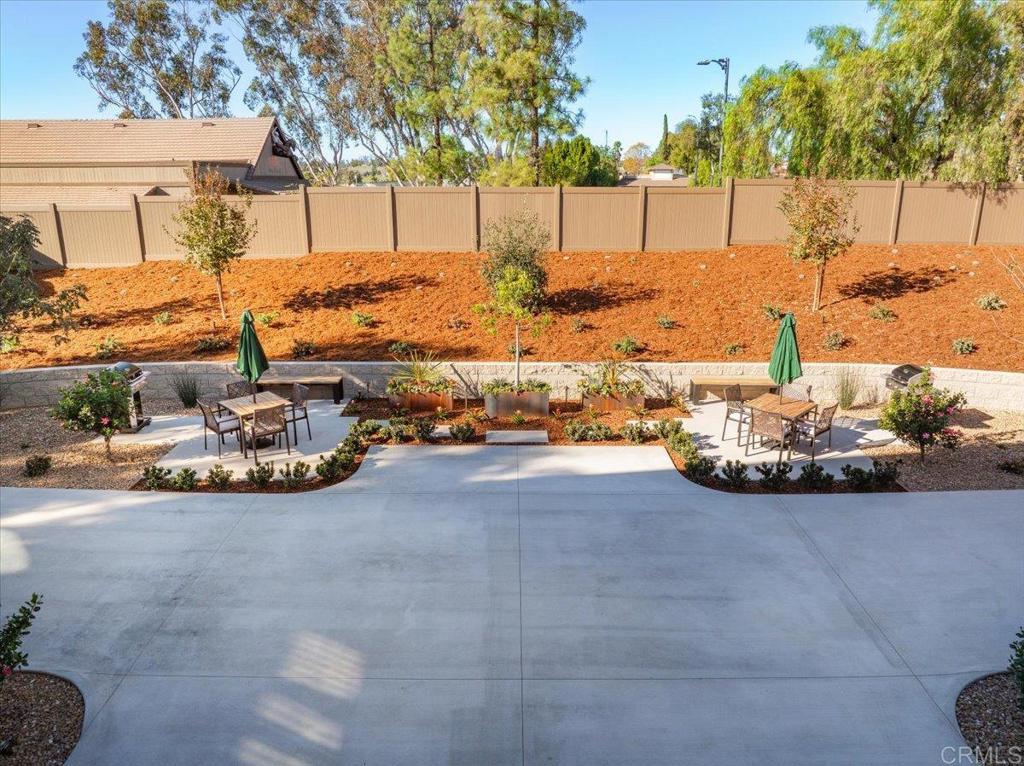 327 D Street Ramona, CA 92065 - Photo 22 of 26 a view of a backyard of white house