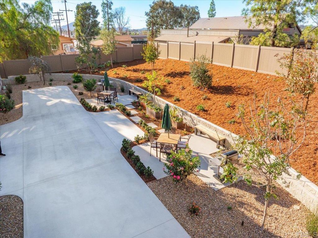 327 D Street Ramona, CA 92065 - Photo 23 of 26 a view of a patio with swimming pool and sitting area