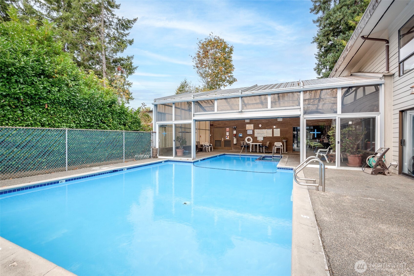 201 Union Avenue Southeast, Unit 157 Renton, WA 98059 - Photo 28 of 33 a view of a house with a backyard and a patio