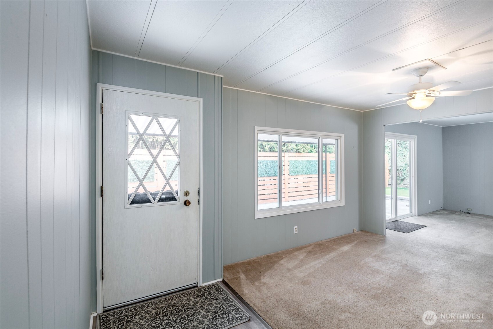 201 Union Avenue Southeast, Unit 157 Renton, WA 98059 - Photo 3 of 33 an empty room with windows and closet