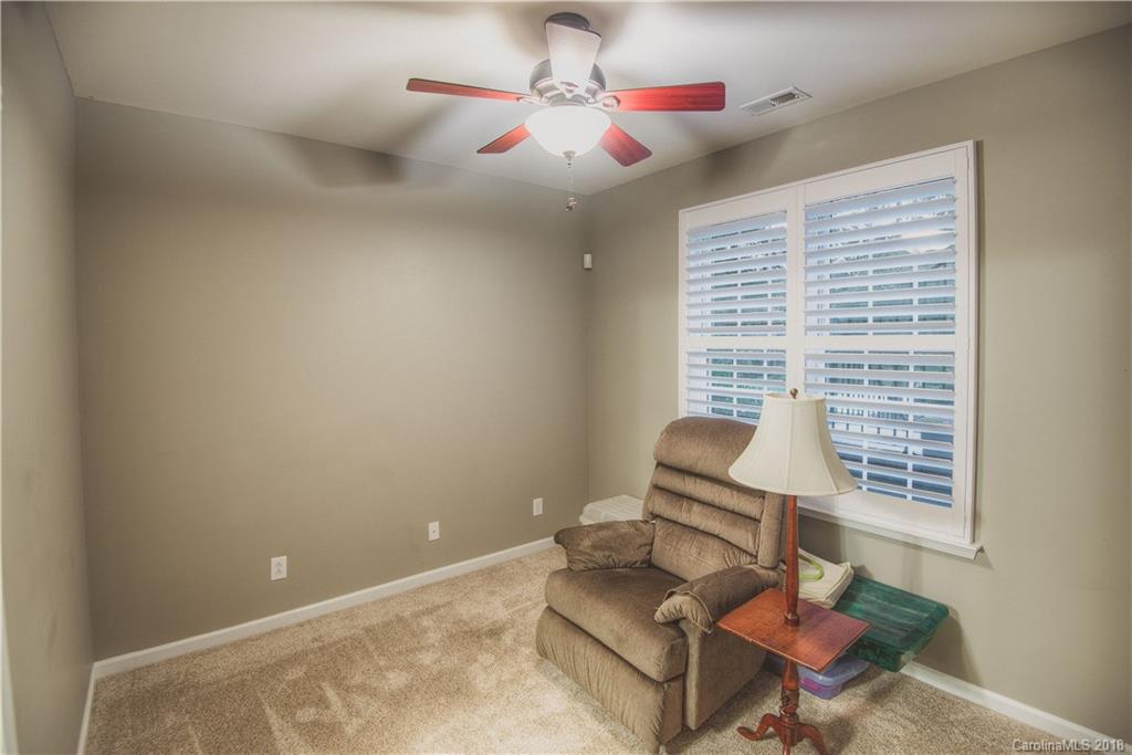 581 6th Baxter Crossing, Unit 1 Fort Mill, SC 29708 - Photo 20 of 34 a living room with furniture