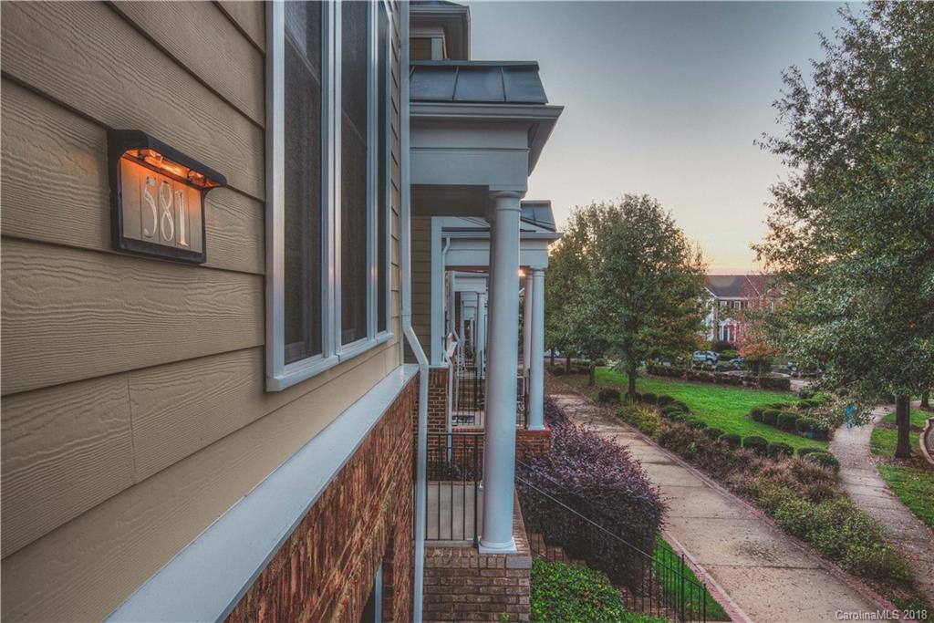 581 6th Baxter Crossing, Unit 1 Fort Mill, SC 29708 - Photo 4 of 34 a view of a balcony and front door