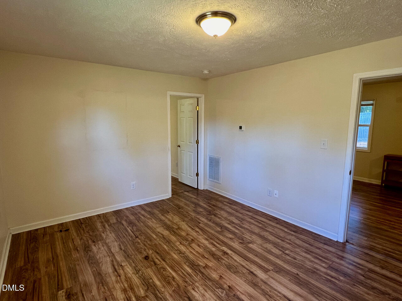 1421 Creech Road Garner, NC 27529 - Photo 9 of 22 wooden floor in an empty room