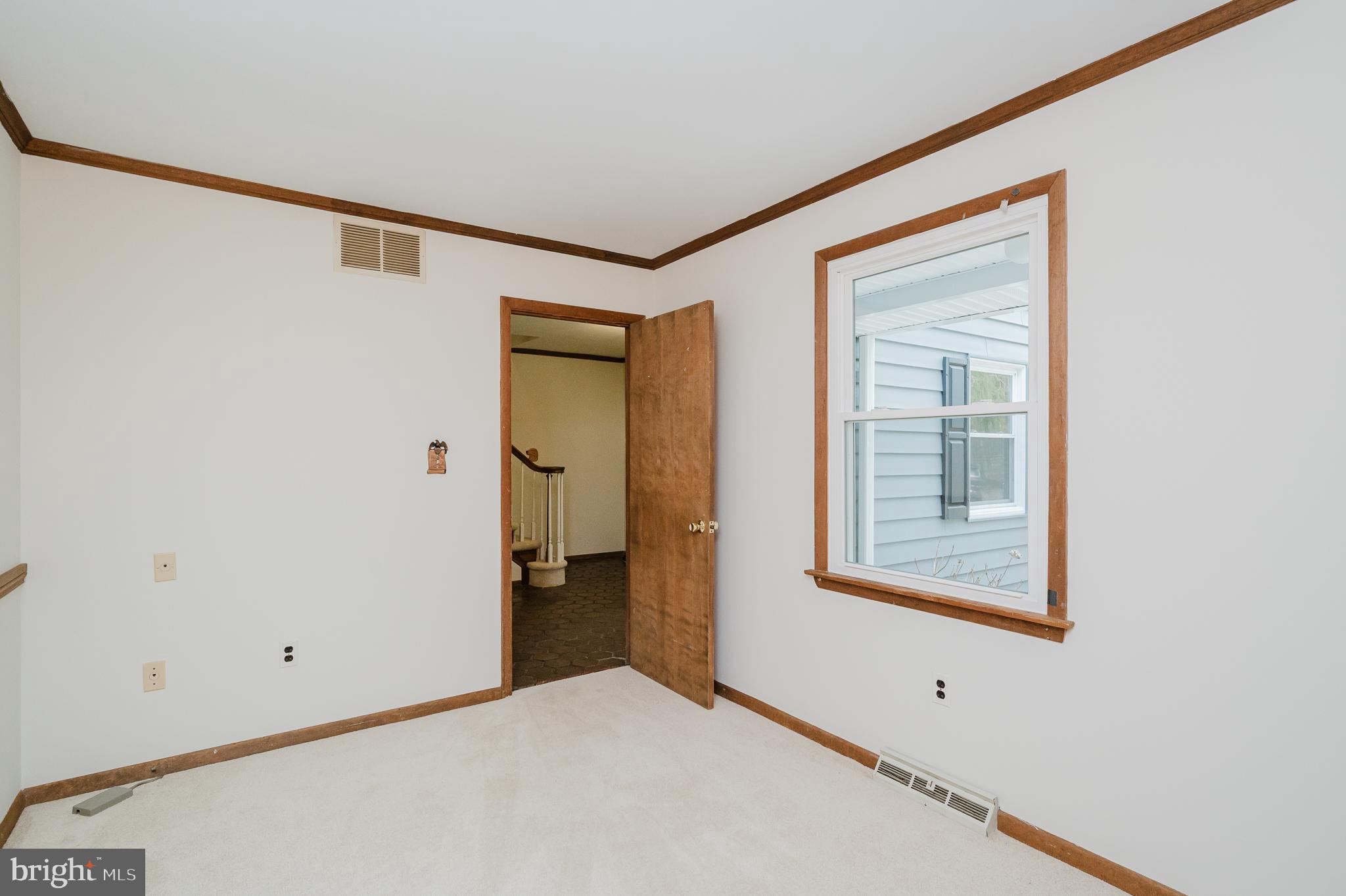2713 Garrett Road White Hall, MD 21161 - Photo 18 of 60 a view of an empty room with a window