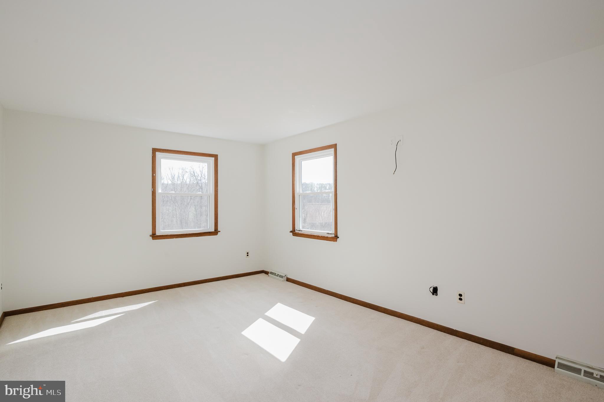 2713 Garrett Road White Hall, MD 21161 - Photo 32 of 60 an empty room with a window